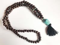 Mala sötétbarna kék howlit Budhafejjel